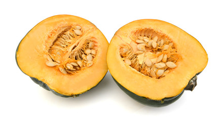 Two halves of an acorn squash on white