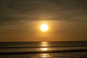 Fototapeta premium Deep and Rich ORange Sunset at Karon Beach