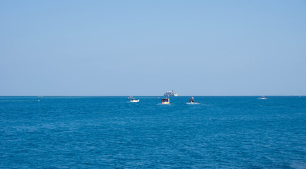 a fishing boat with deep blue dark sea in karimun jawa