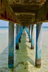 Under the pier on Coconut Beach (Koh Rong Island, Cambodia) 