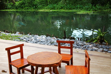 Empty wood table scene among the natural background scene.