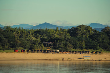 Atmosphere sunset at the Mekong river is bordered by Thailand and Laos