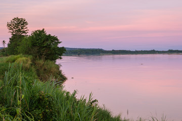 Fototapeta na wymiar Atmosphere sunrise at the Mekong river is bordered by Thailand and Laos