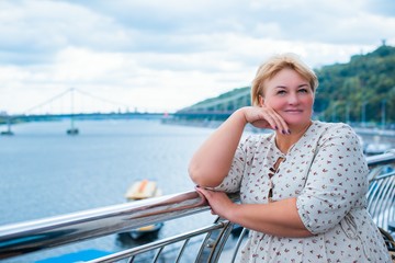 Size plus mature lady. Enjoying at day, concept human with  excess weight. Senior woman take a rest...