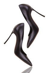 Elegant black high-heeled shoes. Black high-heeled shoes on a white background.