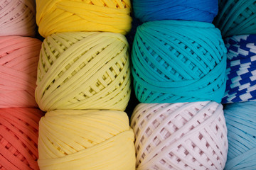 Rolls of colored yarn close-up. Colored yarn. Textile yarn close-up..