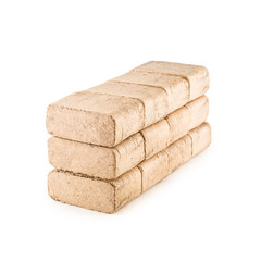 Wooden pressed briquettes from biomass on a white isolated background