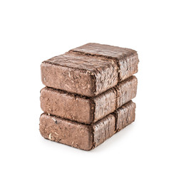 Wooden pressed briquettes from biomass on a white isolated background