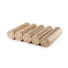 Wooden pressed briquettes from biomass on a white isolated background
