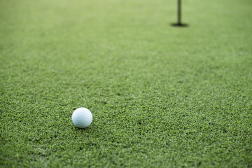 golf ball on the green golf.