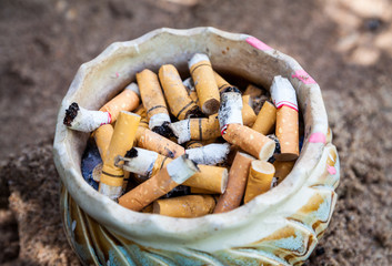 cigarette in ashtray