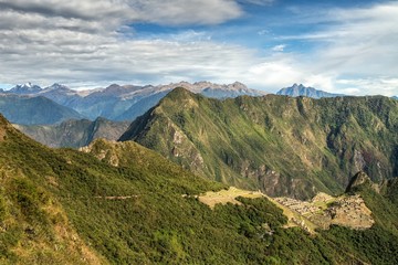 View of the Lost Incan City of Machu Picchu near Cusco, Peru. Machu Picchu is a Peruvian Historical Sanctuary and a UNESCO World Heritage Site. Machu Picchu is located in the Cusco Region in Peru.
