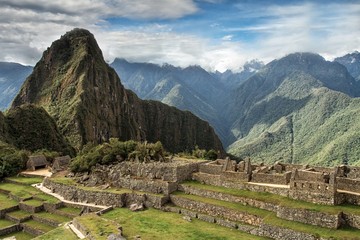 Fototapeta na wymiar Machu Picchu, Peru. The ancient Inca city, located on Peru at the mountain an altitude of 2,450 metersl, dominating the valley of the Urubamba River. Awarded of the New Wonder of the World.