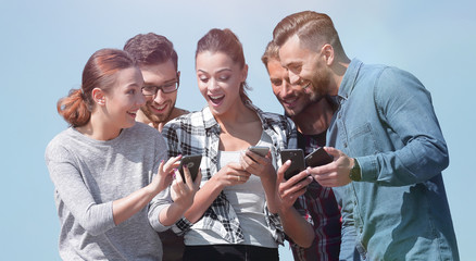 closeup. the group of students using smartphones.