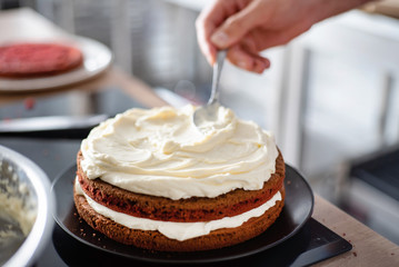 chef making red velvet cake