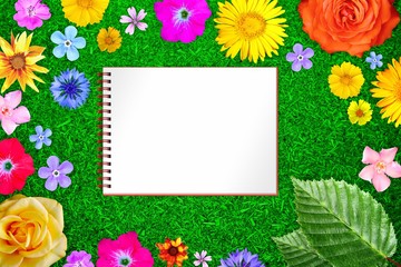 Obraz premium Beautiful flower frame with copybook in center on green particle board background. Floral composition of spring or summer flowers.