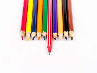 Colour pencils on white background. select focus