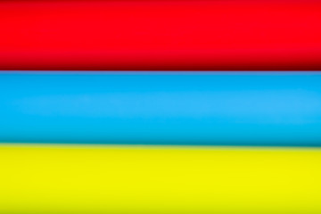 Background of multi-colored stripes. Red, blue, yellow background