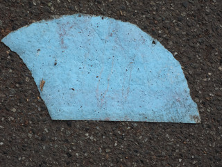 blank paper on tarmac