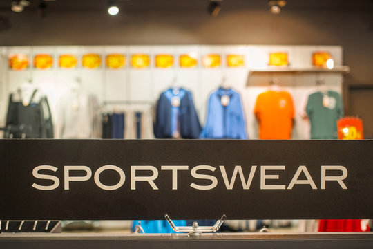 Sportswear - inscription in the store of sporting goods, foreground