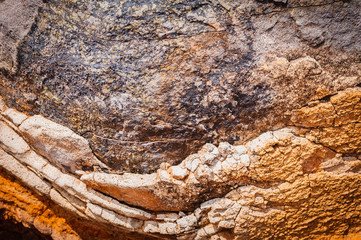 Natural background of petrified lava on the coast of the island. Madeira. Portugal