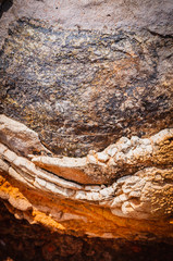 Natural background of petrified lava on the coast of the island. Madeira. Portugal