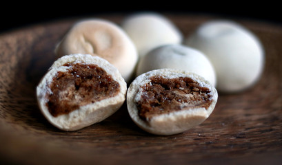 Mini Nopia or Mino. Indonesian cookies with brown sugar. Traditional food from Banyumas, Central Java.