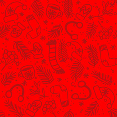 Seamless pattern with red mittens, socks, hats and evergreen branches on bright red background
