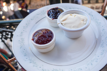 Fresh scones with cream and jam