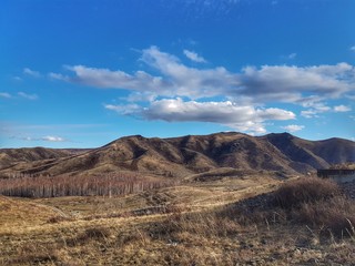 Beautiful natural landscape. Mountains, sky, clouds.