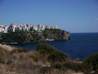 Fototapeta na wymiar Cliff Sea Landscape with Condos in Turkey