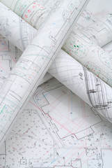 Architectural plans lying on drawing board