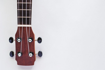 Ukulele on white background for musical instrument and relaxation concept