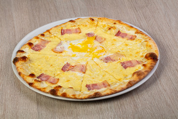 Pizza carbonara with bacon