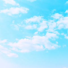 Pastel blue sky with clouds