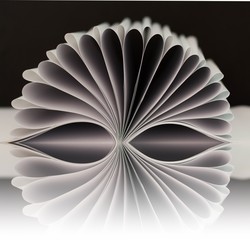 Book pages folded into a flower shape and