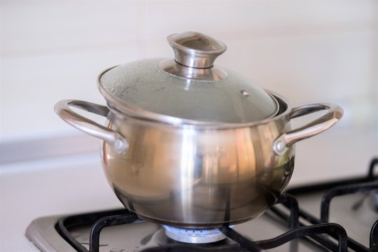 stainless steel pan during cooking on a gas stove