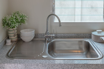 sink with faucet in kitchen room