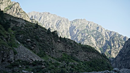 Mountain peak range landscape. Green mountain range view. Mountain peak blue sky white clouds panorama