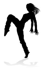 A woman street dance hip hop dancer in silhouette