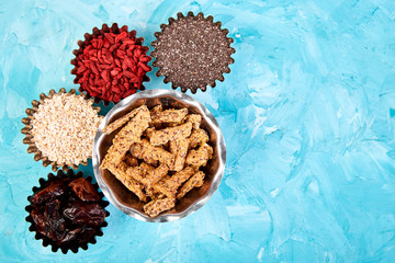Various superfoods in small bowl near granola