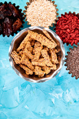 Various superfoods in small bowl near granola