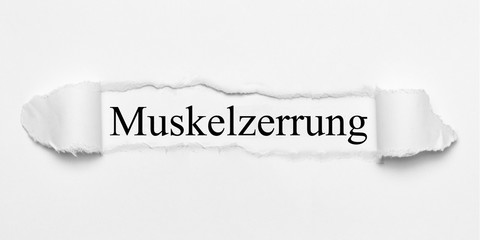 Obraz premium Muskelzerrung auf weißen gerissenen Papier