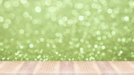 Wood table top on abstract light christmas bokeh background for design