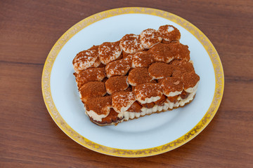 Traditional italian dessert tiramisu on a table