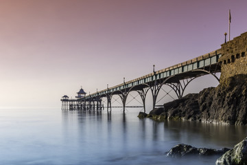 Autumn sunset with Clevedon Pier jutting out into a misty Bristol Channel