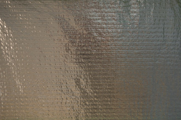 Steel packed with foil. Reinforced foil film. Vintage Creative Background