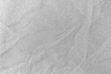 Silver glitter shiny paper be crumpled for christmas background, Celebration concept.