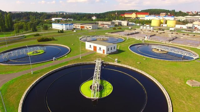 Aerial view to sewage treatment plant. Grey water recycling. Waste management theme. 