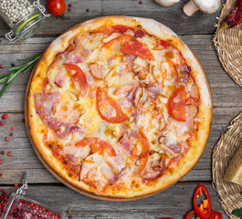 Pizza with tomatoes, mozzarella cheese. Delicious italian pizza